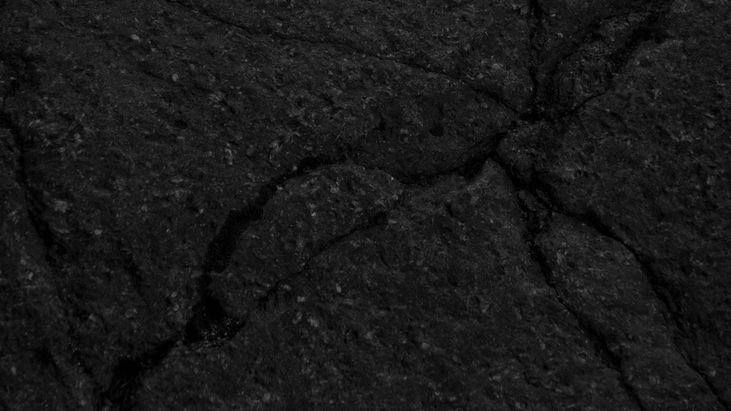 Pitch — black rock and water study